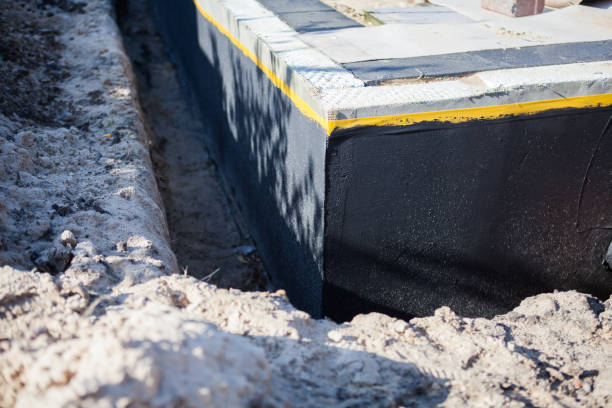 Professional Basement Waterproofing technician working in Birmingham, NJ